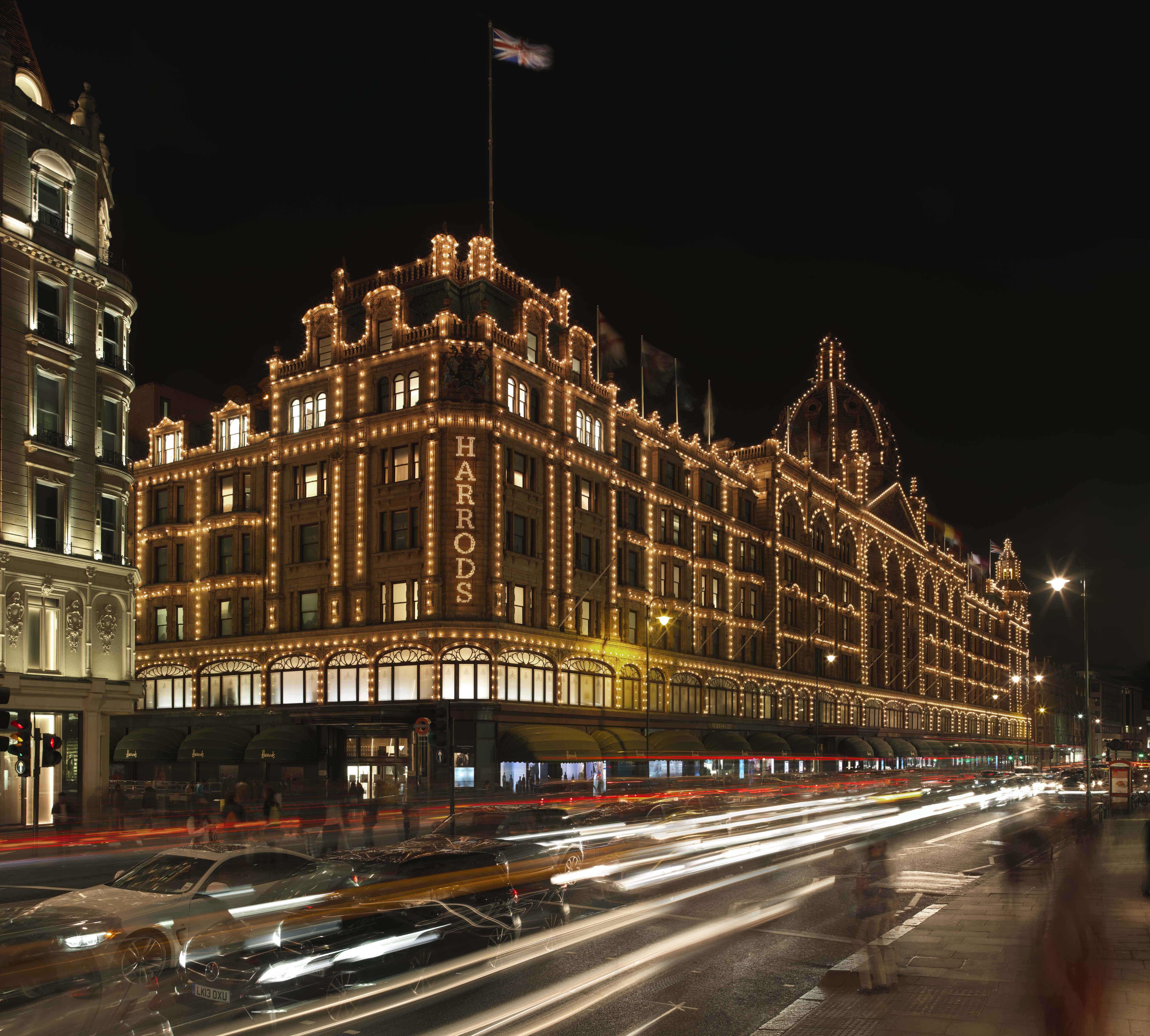 Exterior view of Harrods at night time